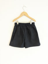 Load image into Gallery viewer, Black M&amp;S PE Shorts - 7 Years
